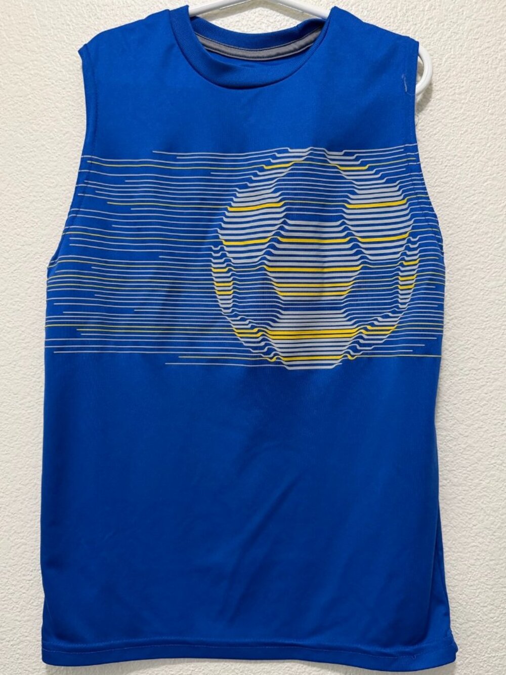 Athletic Works boy's blue sleeveless soccer shirt, large (10/12)